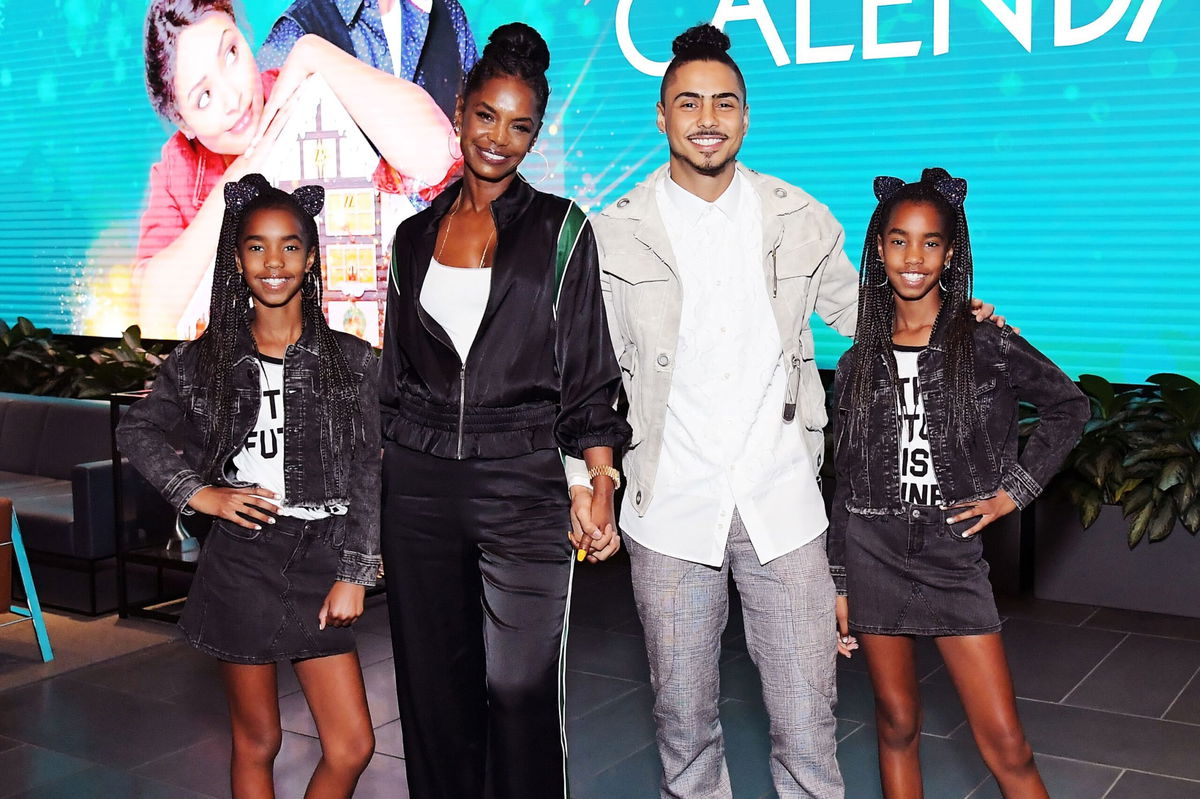 <i>Charley Gallay/Getty Images via CNN Newsource</i><br/>Kim Porter (second from left)