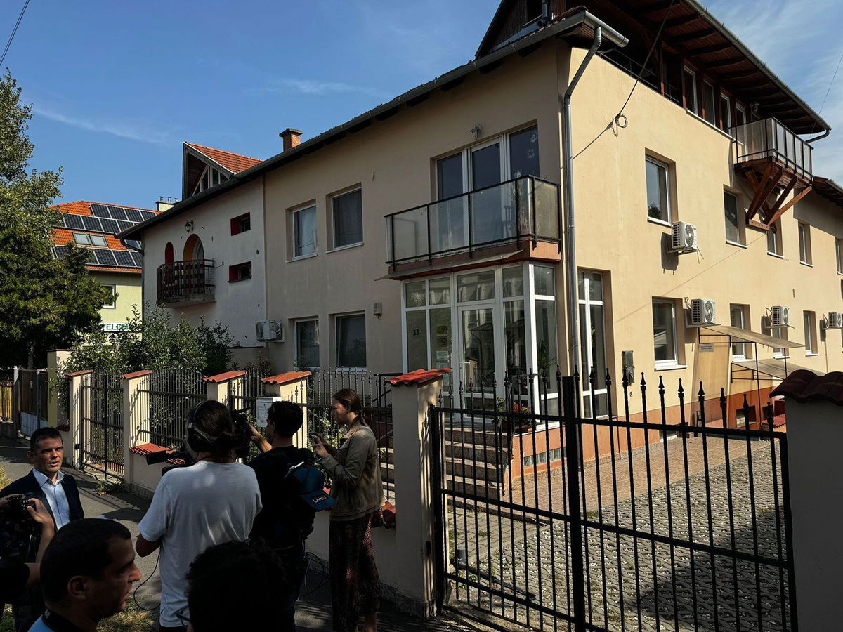 <i>Jakub Porzycki/Anadolu/Getty Images/File via CNN Newsource</i><br/>Reporters gathered outside the registered address for BAC Consulting in Budapest