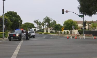 Police are seen near the scene of an explosion at the Santa Maria Superior courthouse on September 25 in Santa Maria