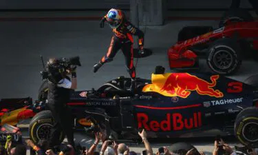 Ricciardo celebrates winning the 2018 Chinese Grand Prix with Red Bull.