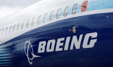 The Boeing logo is seen on the side of a Boeing 737 MAX at the Farnborough International Airshow