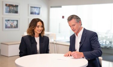 Demi Lovato joins California Gov. Gavin Newsom to sign legislation to protect the financial security of child influencers.