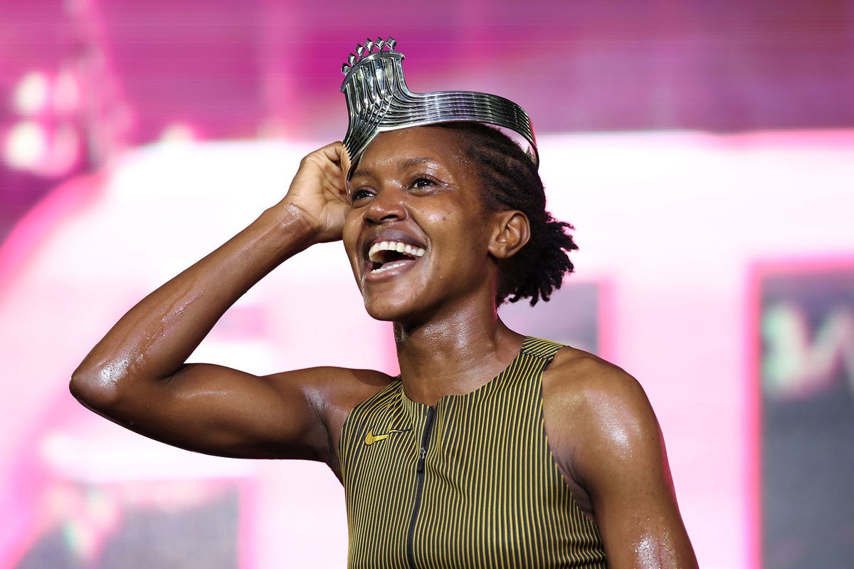 <i>Patrick Smith/Athlos/Getty Images via CNN Newsource</i><br/>Faith Kipyegon celebrates after winning the 1