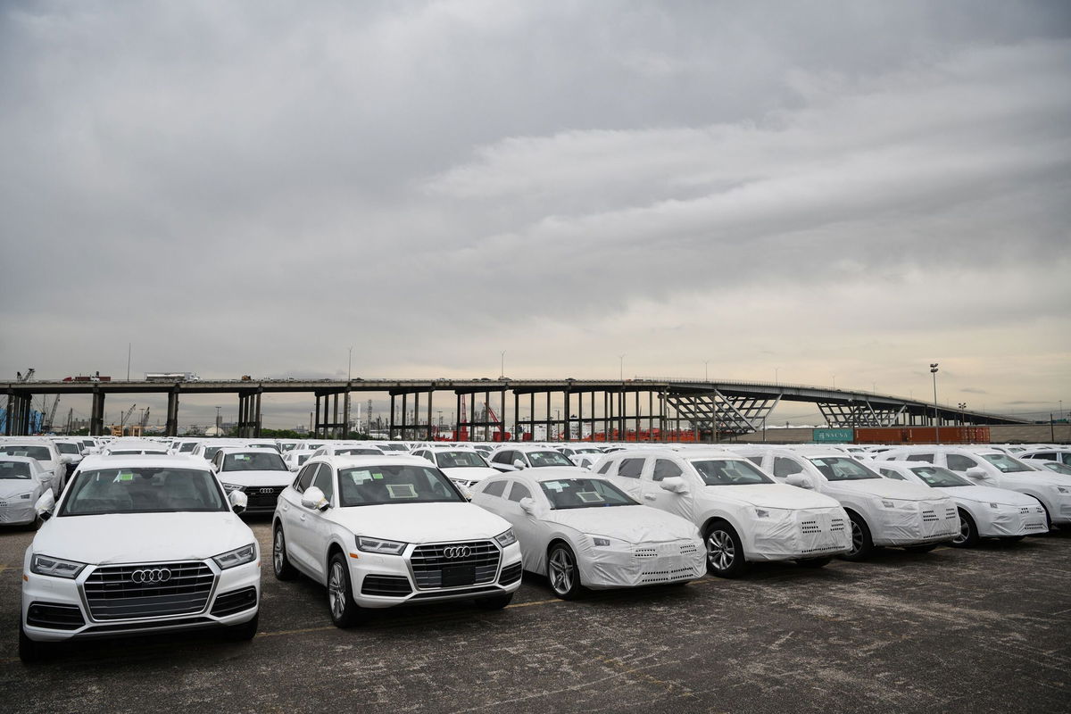 <i>Loren Elliott/Bloomberg/Getty Images/File via CNN Newsource</i><br/>Audi imported vehicles sit parked in a storage lot at the Port of Houston in a 2019 file photo. Auto imports could be impacted by a strike along the East and Gulf coasts set for Tuesday.