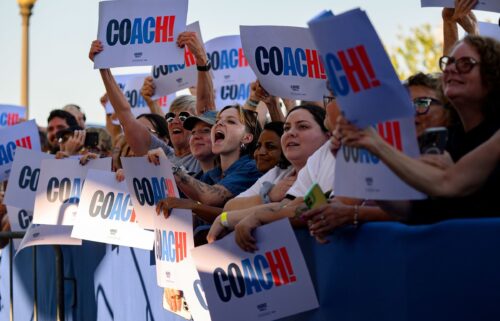 Attendees listen to Walz speak at a campaign rally in Erie