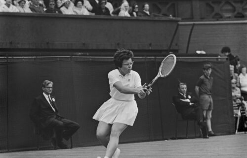 Billie Jean King in action at Wimbledon in 1965.