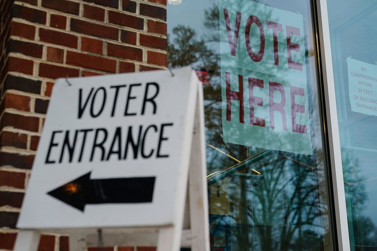 <i>Elijah Nouvelage/Getty Images via CNN Newsource</i><br/>Signs directing voters are seen ouside a polling place on March 5 in Mountain Brook