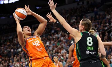 Connecticut Sun forward Brionna Jones shoots over Minnesota Lynx forward Alanna Smith.