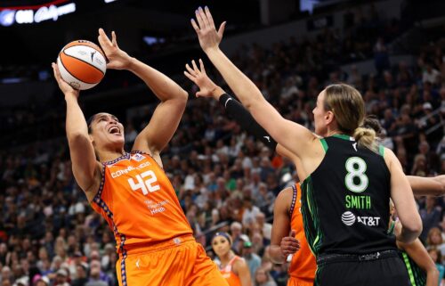 Connecticut Sun forward Brionna Jones shoots over Minnesota Lynx forward Alanna Smith.