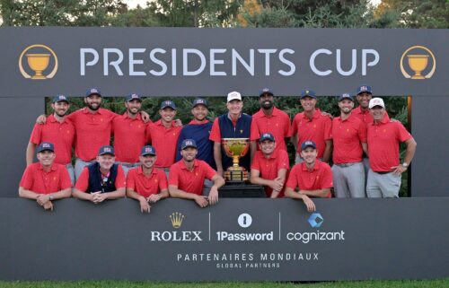 Team USA poses with the trophy after winning the 2024 Presidents Cup at Royal Montreal Golf Club in Quebec