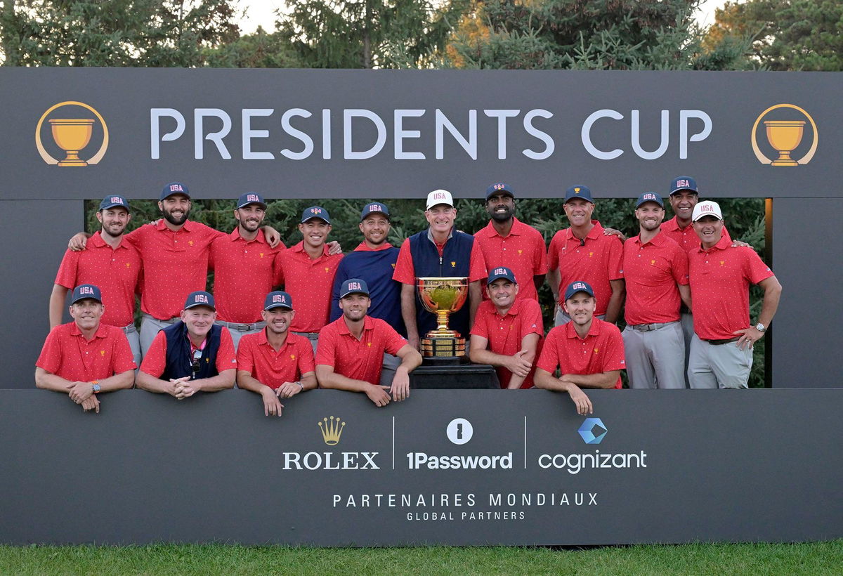 <i>Eric Bolte/USA TODAY Sports/Reuters via CNN Newsource</i><br/>Team USA poses with the trophy after winning the 2024 Presidents Cup at Royal Montreal Golf Club in Quebec