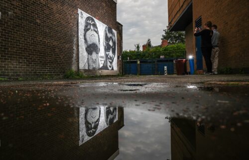 A mural depicting Liam and Noel Gallagher of Oasis is pictured in Manchester