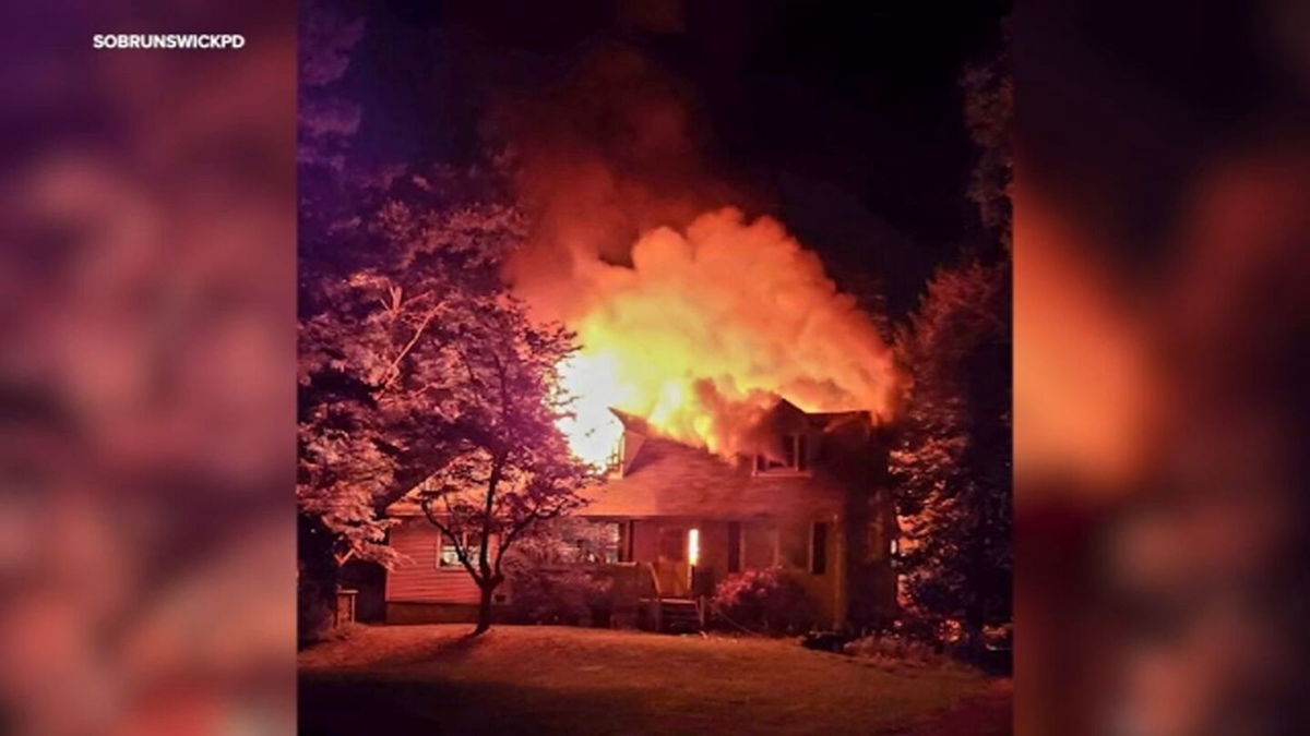 <i>SOBRUNSWICKPD/WABC via CNN Newsource</i><br/>Law enforcement sources say a man who got into an argument with his girlfriend set her parents' home on fire in South Brunswick early Tuesday morning.