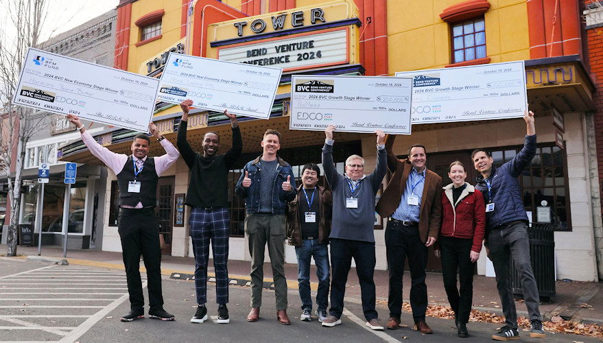 Companies that won funding at the 2024 Bend Venture Conference celebrate outside the Tower Theatre in downtown Bend.