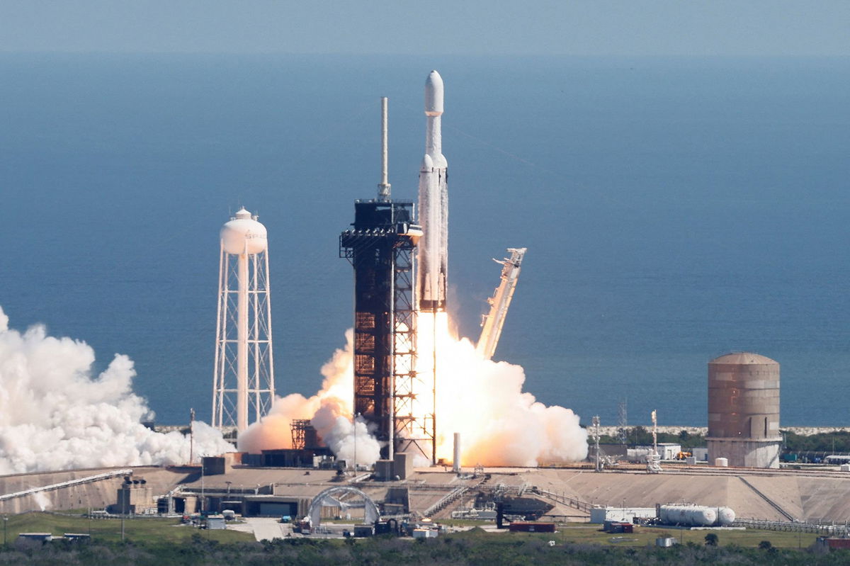 A SpaceX Falcon Heavy rocket is launched for the Europa Clipper mission to study one of Jupiter's 95 moons, at Kennedy Space Center in Cape Canaveral, Florida, U.S. October 14, 2024.  