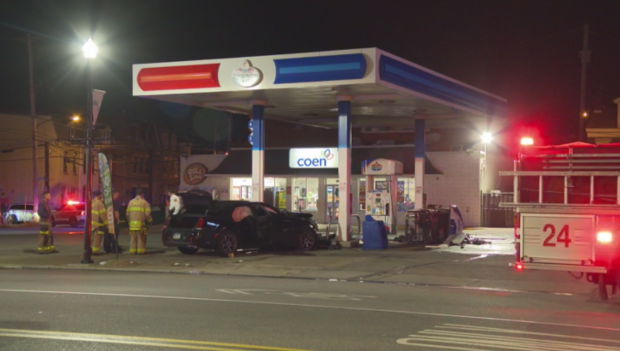 <i>KDKA Photojournalist Bryce Lutz via CNN Newsource</i><br/>The man driving the vehicle that crashed into the pumps was said to be fighting with officers in the street. A police officer was taken to the hospital to be treated for a hand injury.