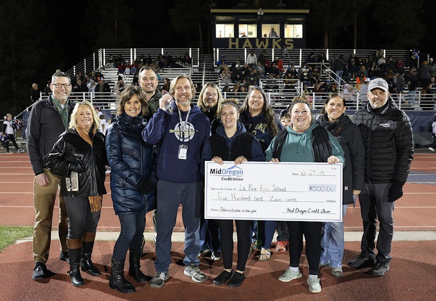 La Pine HS Principal Scott Olszewski, honored as Administrator of the Year, is fifth from left.