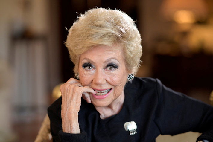 Actress Mitzi Gaynor poses in her apartment Wednesday, May 26, 2021, in Beverly Hills, Calif. Gaynor, among the last survivors of the so-called golden age of the Hollywood musical, died of natural causes in Los Angeles on Thursday, Oct. 17, 2024. She was 93. 