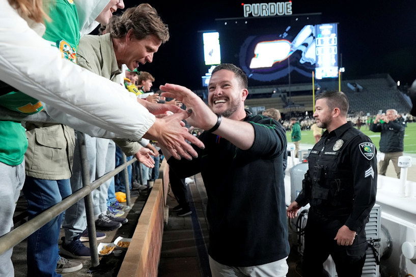 Oregon head coach Dan Lanning celebrates with fans after his team defeated Purdue in an NCAA college football game in West Lafayette, Ind., on Friday.