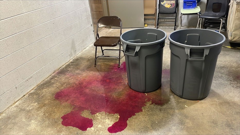 Leaking heating system pipes have become a fact of life at Redmond High that school district bond measure would address. (The purple liquid is from rust inhibitor in the water.)