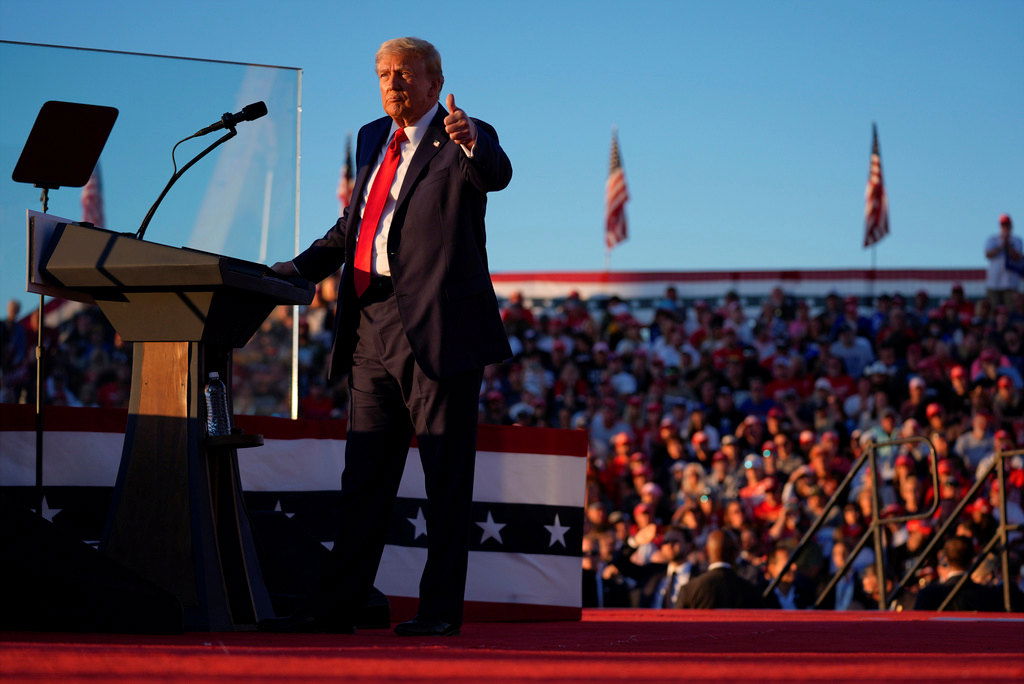 Republican presidential nominee former President Donald Trump gestures at a campaign rally at the Butler Farm Show, Saturday, Oct. 5, 2024, in Butler, Pa.