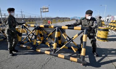 South Korean soldiers set a barricade at a checkpoint on the Tongil bridge