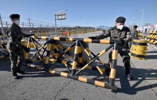 South Korean soldiers set a barricade at a checkpoint on the Tongil bridge