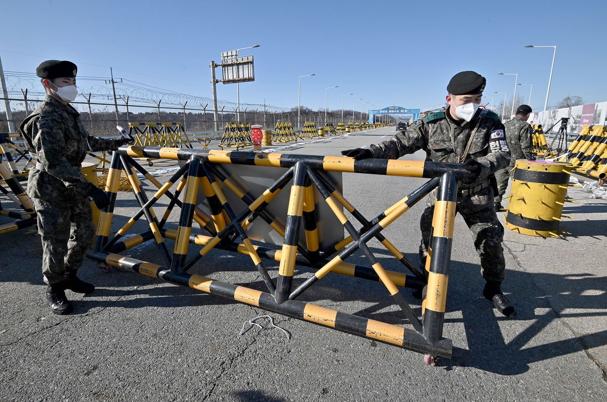 <i>Jung Yeon-je/AFP/Getty Images via CNN Newsource</i><br/>South Korean soldiers set a barricade at a checkpoint on the Tongil bridge