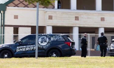 Officers stand outside Apalachee High School on September 5 in Winder