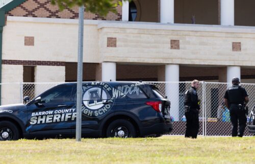 Officers stand outside Apalachee High School on September 5 in Winder