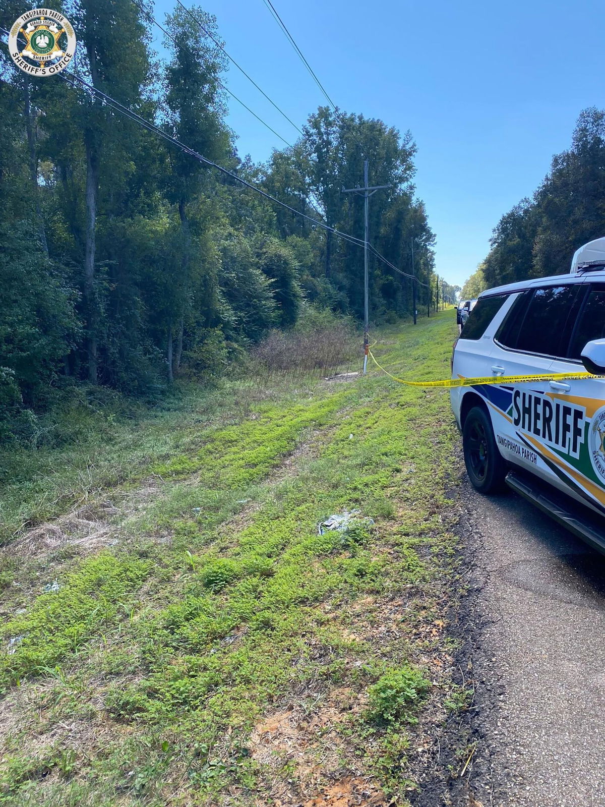 <i>Tangipahoa Parish Sheriff's Office via CNN Newsource</i><br/>The scene where William Nicholas Abraham's body was found in a tarp is seen along Highway 51 in Tangipahoa Parish