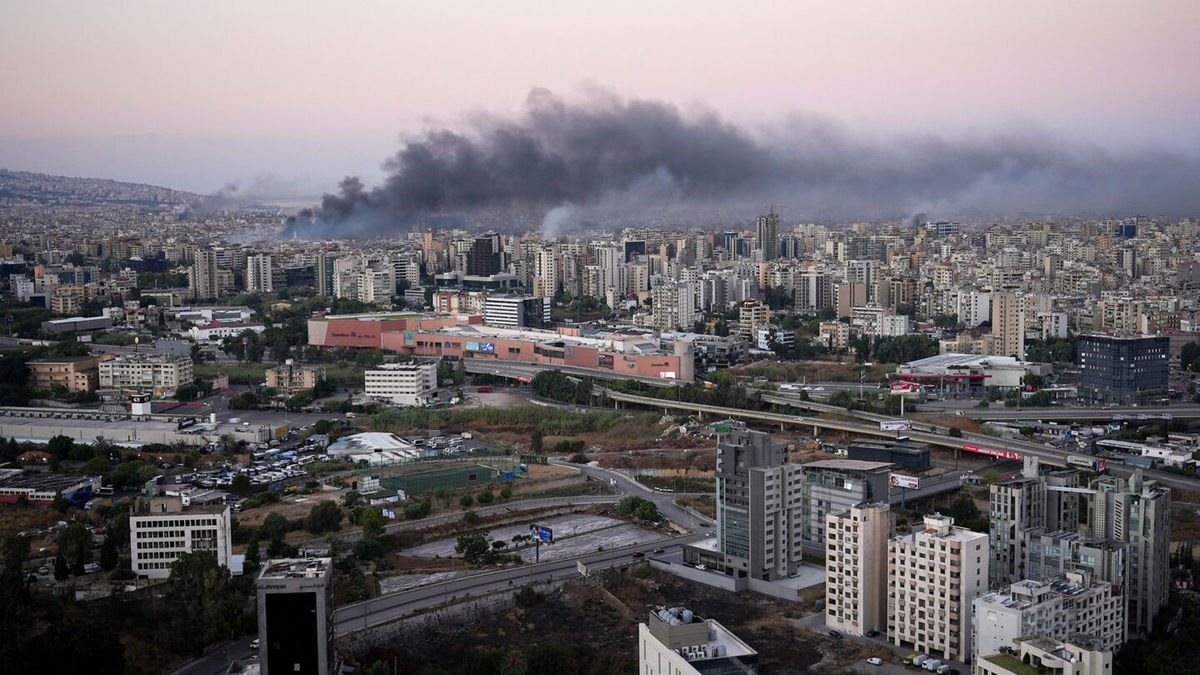 <i>Joseph Campbell/Reuters via CNN Newsource</i><br/>Smoke billows over Beirut