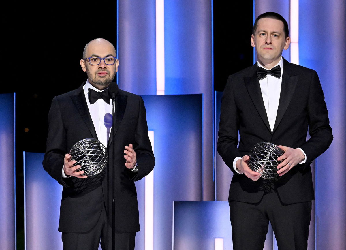 <i>Lester Cohen/Getty Images for Breakthrough Prize via CNN Newsource</i><br/>Demis Hassabis (left) and John Jumper accept awards during the 10th Breakthrough Prize ceremony in Los Angeles in April.