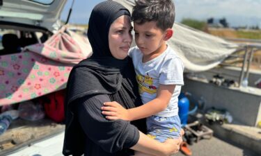 Umm Mohammed and her five-year-old son who escaped the Israeli bombardment of southern Lebanon