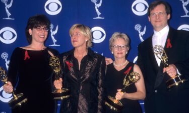 Dava Savel (left) poses with Ellen DeGeneres and writers Tracy Newman and Jonathan Stark at the 1997 Emmy Awards.