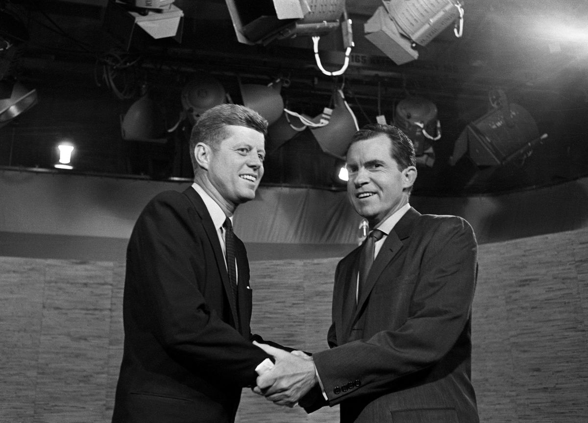 <i>Bettmann Archive/Getty Images via CNN Newsource</i><br/>Presidential candidates John F. Kennedy and Richard Nixon shake hands after their televised debate in Washington