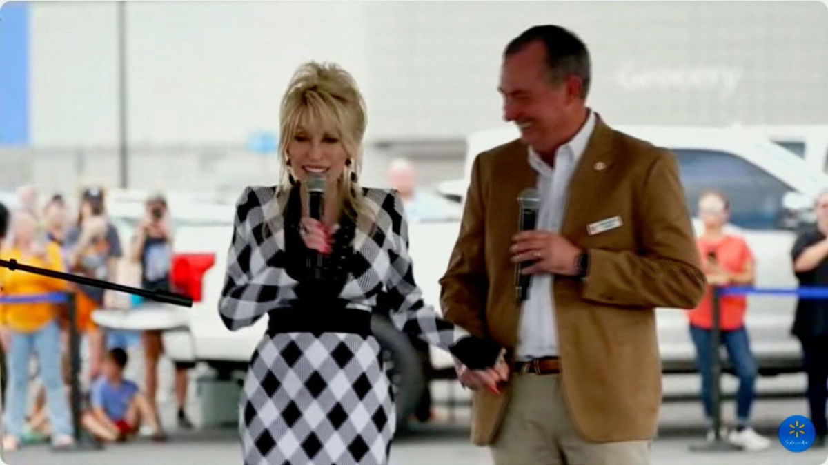 <i>Walmart via CNN Newsource</i><br/>Dolly Parton speaks during a press conference