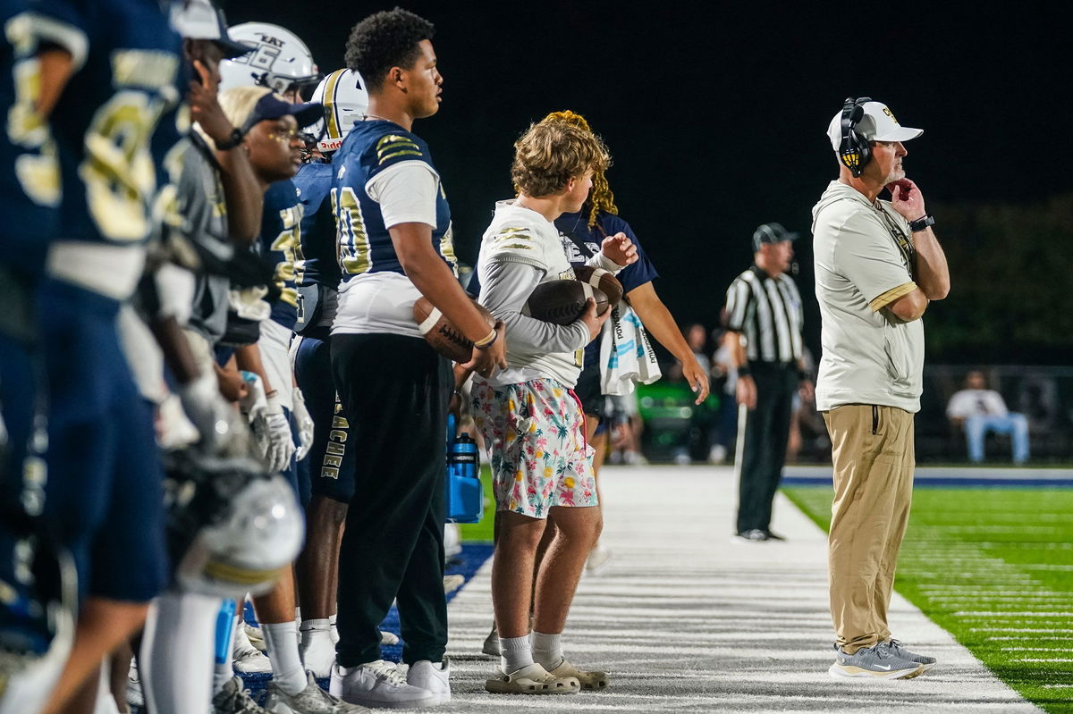 <i>Elijah Nouvelage for CNN via CNN Newsource</i><br/>Head football coach Mike Hancock is seen on the sidelines during Friday's game.