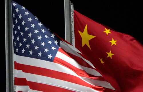 The American and Chinese flags are seen in Zhangjiakou