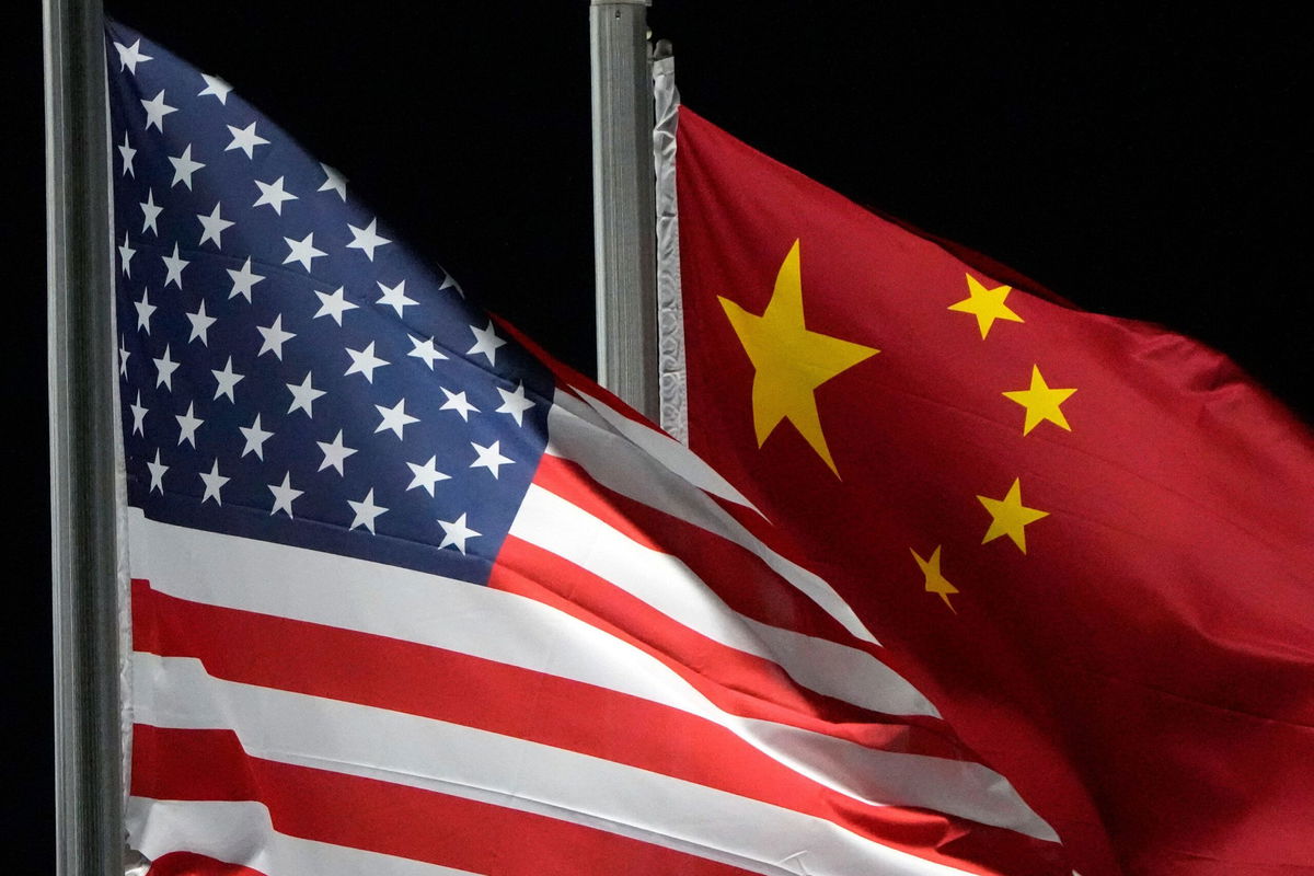 <i>Kiichiro Sato/AP/File via CNN Newsource</i><br/>The American and Chinese flags are seen in Zhangjiakou