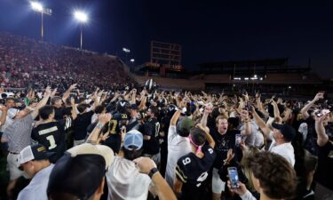 Vanderbilt Commodores players and fans celebrate following their win.