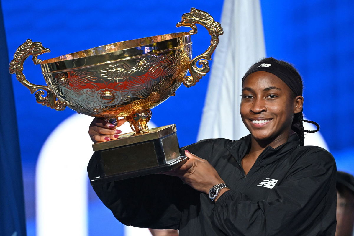 <i>Greg Baker/AFP/Getty Images via CNN Newsource</i><br/>Coco Gauff celebrates with the trophy after winning the women's singles final match against Czech Republic's Karolina Muchova at the China Open.