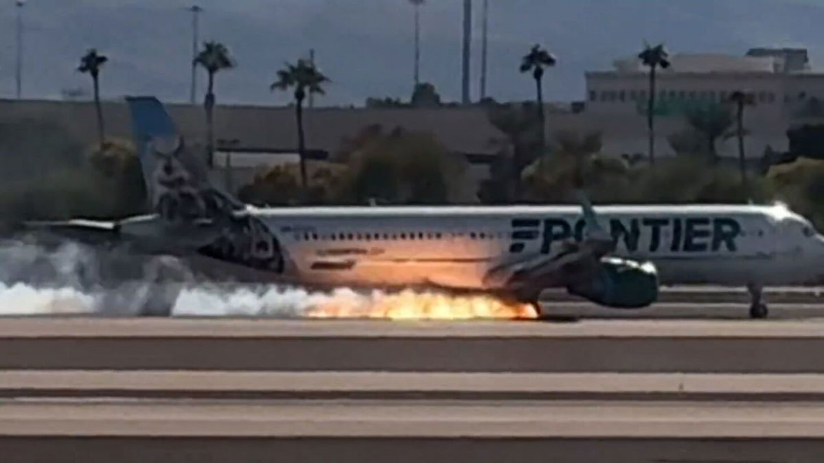 <i>@TylerHerrick/X via CNN Newsource</i><br/>Video captured the moment when fire was seen underneath a Frontier flight as it landed at Harry Reid International Airport in Las Vegas.