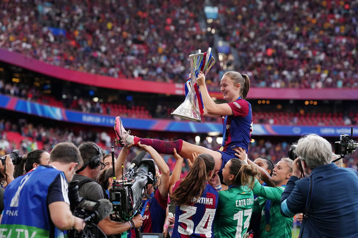 <i>Juan Manuel Serrano Arce/Getty Images via CNN Newsource</i><br/>Graham Hansen celebrates with the 2023/24 UEFA Women's Champions League Trophy.