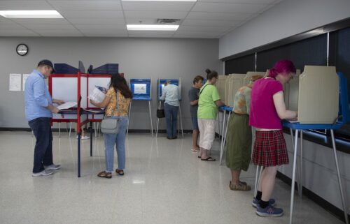 People arrive to cast their ballot during early voting in Minnesota on September 20.