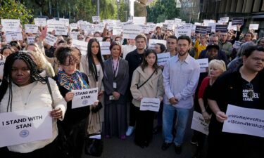 ABC workers and other supporters gather at its Sydney office on May 22