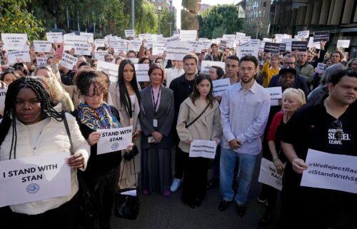 ABC workers and other supporters gather at its Sydney office on May 22