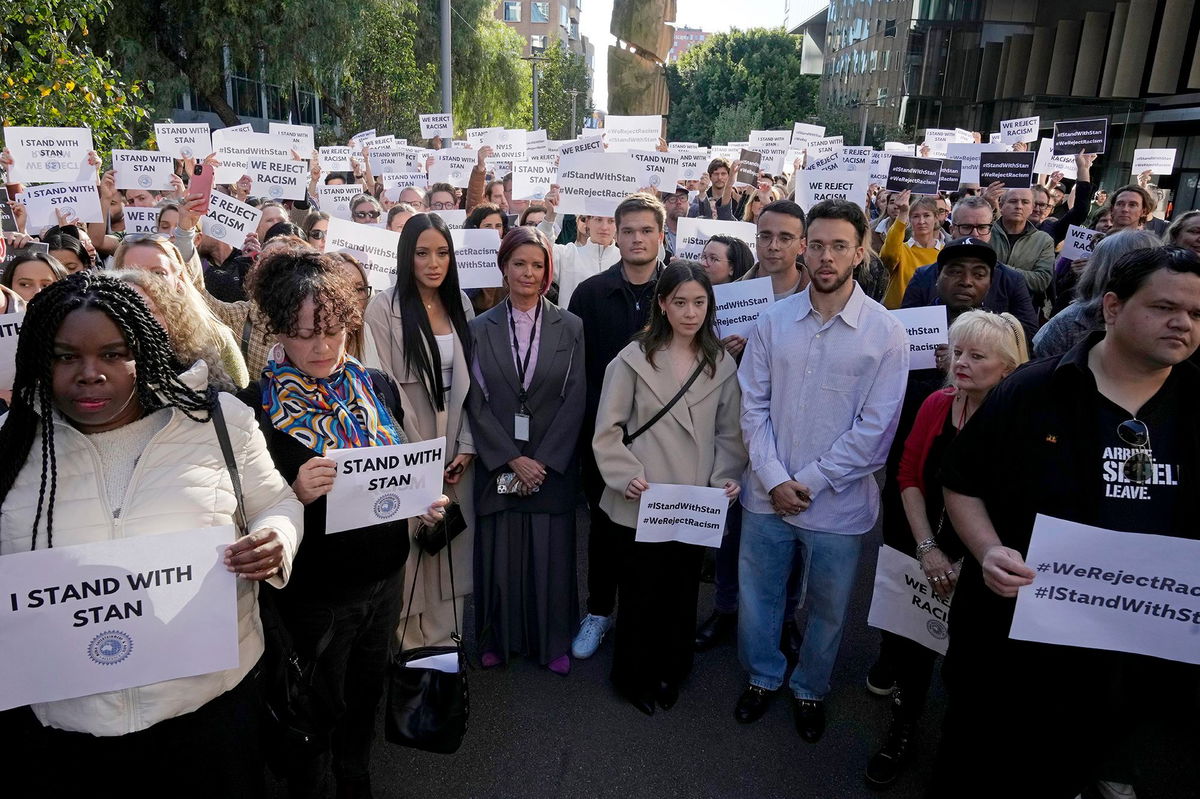 <i>Rick Rycroft/AP via CNN Newsource</i><br/>ABC workers and other supporters gather at its Sydney office on May 22