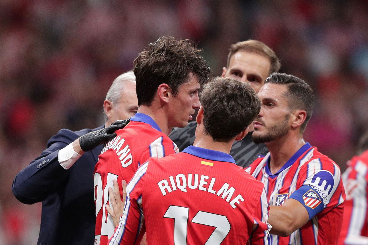 <i>Gonzalo Arroyo Moreno/Getty Images via CNN Newsource</i><br/>Atlético Madrid defender Robin Le Normand (No. 24) stands after inadvertently clashing heads with Aurelien Tchouameni of Real Madrid.