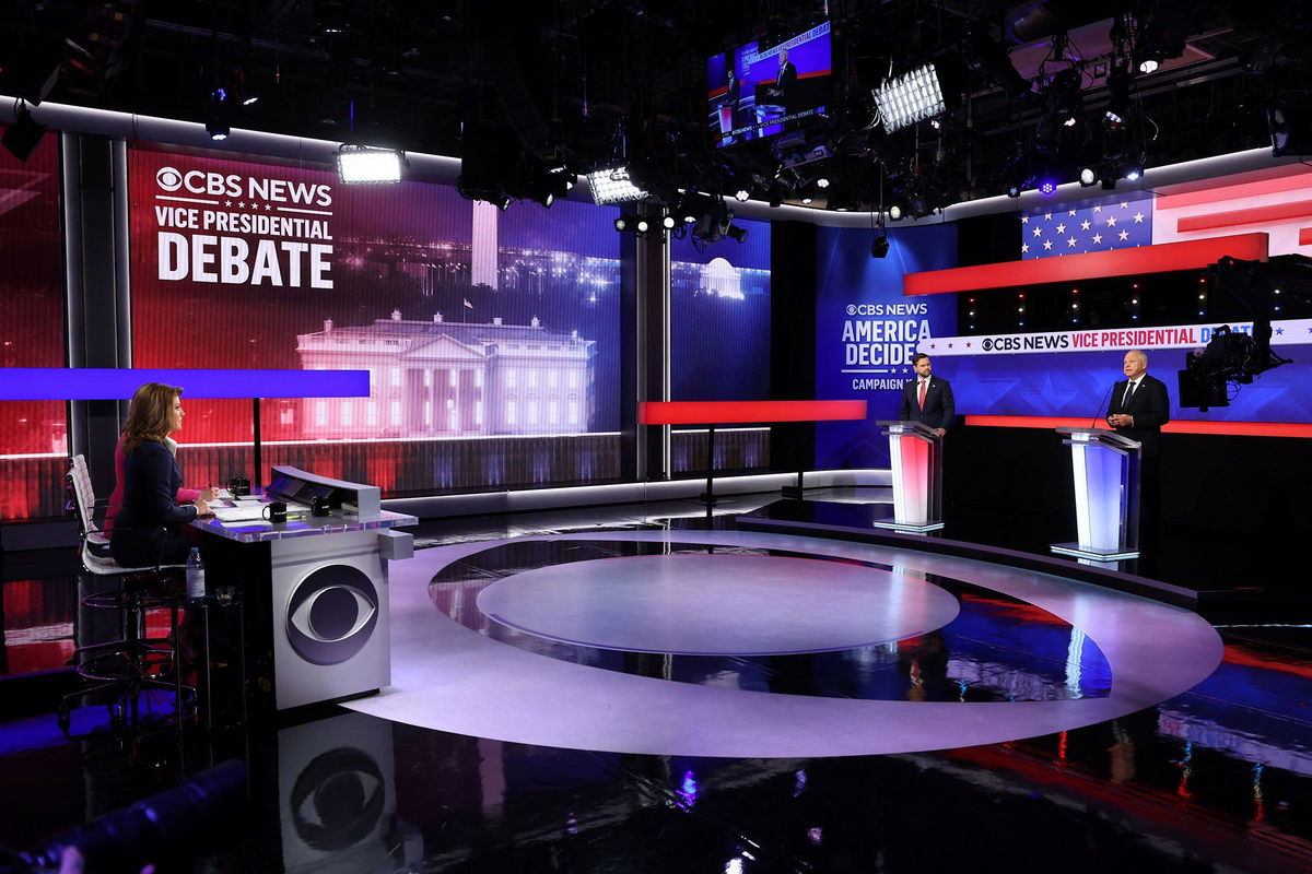 <i>Mike Segar/Reuters via CNN Newsource</i><br/>Minnesota Gov. Tim Walz and Sen. JD Vance attend a debate hosted by CBS News in New York on October 1.